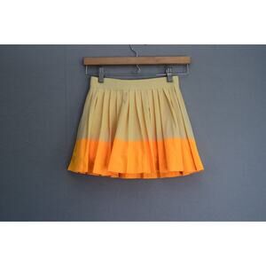 ATHLETA GIRL Pleat Perfect Pleated Tennis Skirt Skort Beige Orange 8-10 M Medium